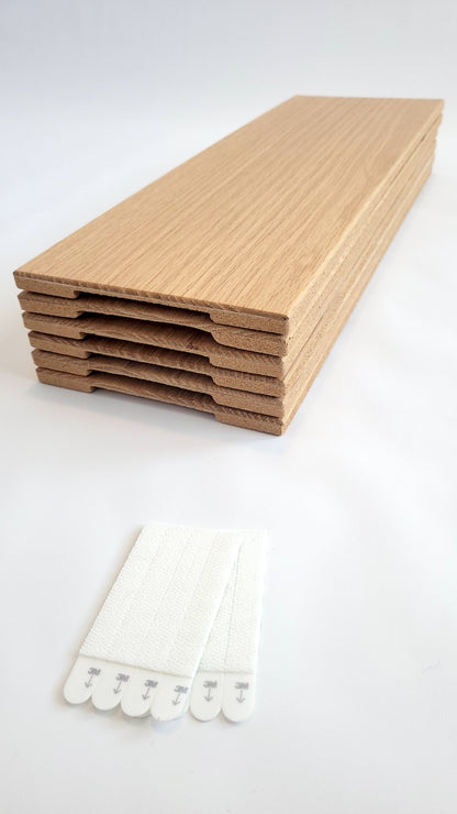 TALAYA Solid Ground tile set of 6 in Honey Oak finish, stacked, on white background, with included adhesive picture hangers