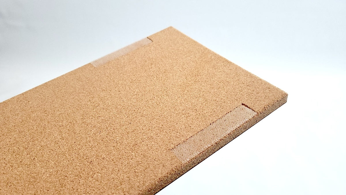 TALAYA Solid Ground tile cork backing with built-in attachment point for adhesive picture hangers, detail view on white background