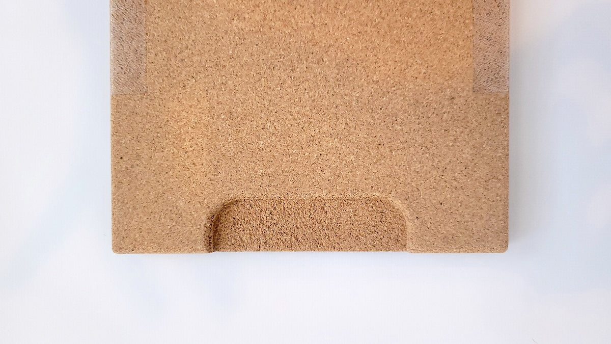 TALAYA Solid Ground tile cork backing with proprietary handle cutout for easy removal, close-up straight-on view on white background